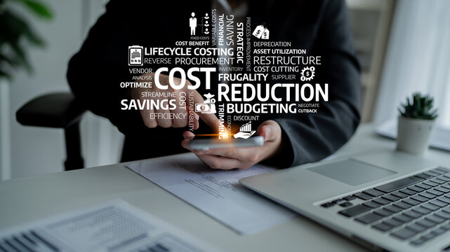 A business professional engages with a mobile device in a modern office, focusing on cost reduction strategies and financial efficiency to drive organizational savings and innovations. Tessel