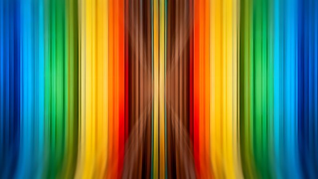 Vibrant vertical rainbow stripes with central X-shaped blur effect on abstract background