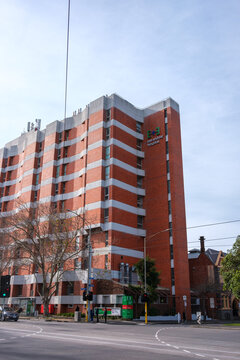 Modern Red Brick Hospital Building In An Urban Setting Symbolizing Public Healthcare And Medical Services