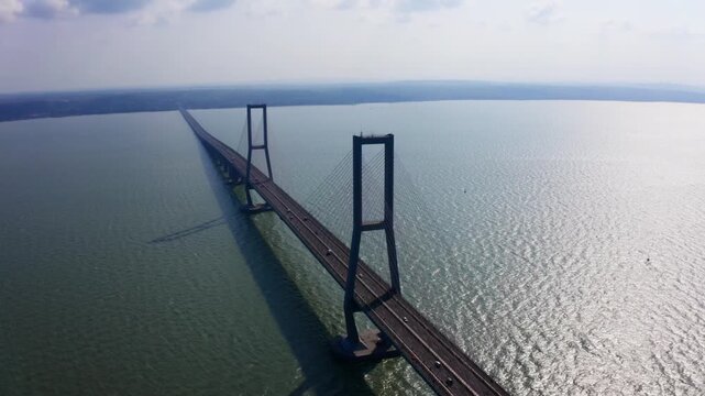 Aerial view of Suramadu Bridge and Madura Strait in Surabaya Indonesia