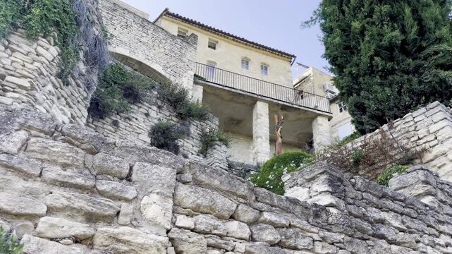 Low-angle view of a traditional Provencal stone house built