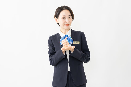 制服を着た受付係の女性　ジョブイメージ