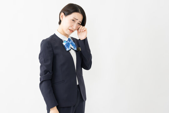 制服を着た受付係の女性　ジョブイメージ