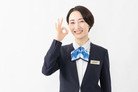 制服を着た受付係の女性　ジョブイメージ