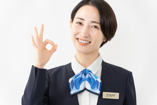 制服を着た受付係の女性　ジョブイメージ