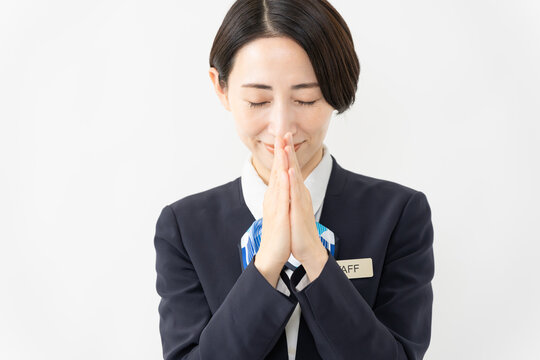 制服を着た受付係の女性　ジョブイメージ
