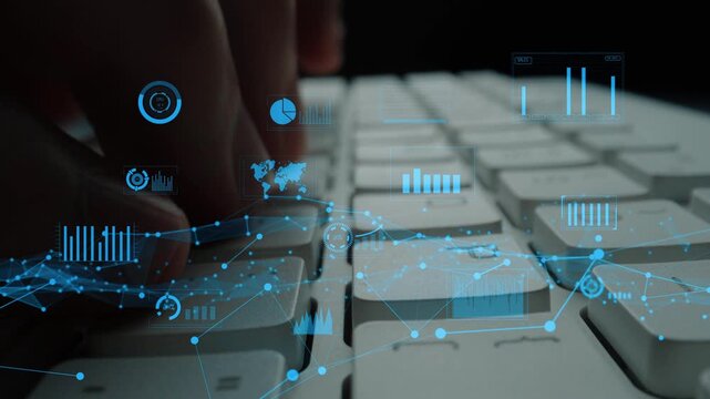 A close-up view of hands typing on a computer keyboard, with digital graphs and analytics data overlaid, representing modern data analysis and technology usage in business. Xenic