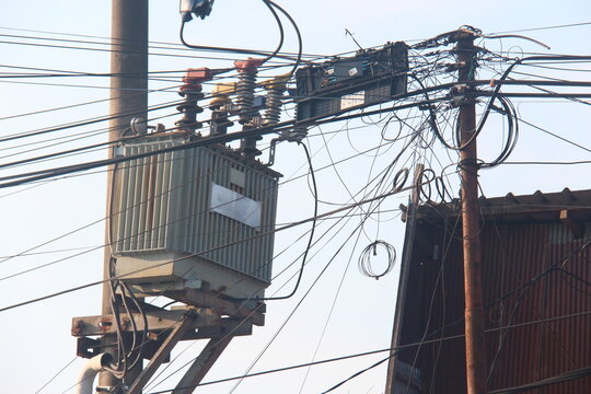 Electric Distribution Transformer with Fiber Optic Communication Network