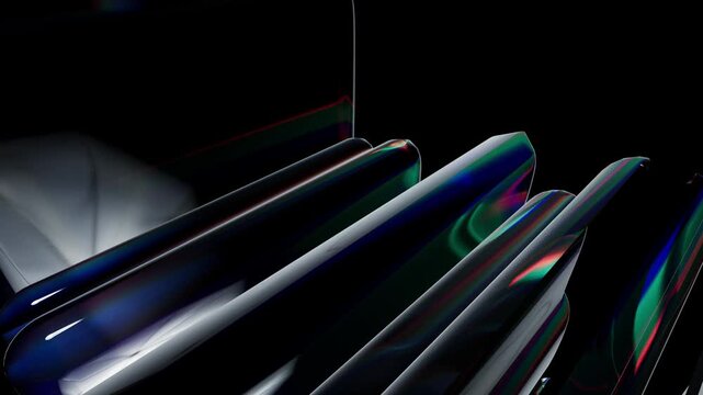 Black smartphones shape stacked on top of each other isolated on a dark background showing sleek modern design and premium mobile technology aesthetic