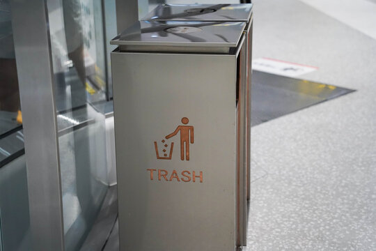 Two trash cans in a shopping mall, cleaning up a recycling concept (trash bin)