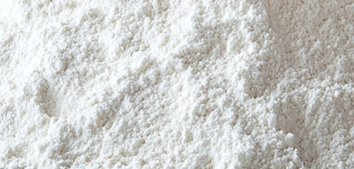 Fototapeta premium Close-up texture of a heap of finely ground white powder substance