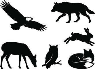 Collection of various wild forest animals depicted in a striking black and white art style silhouette © MstShilpy