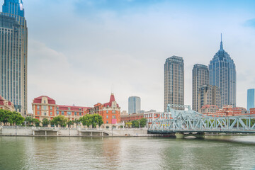 Fototapeta premium The modern urban architecture skyline and Haihe River scenery in Tianjin, China were captured on April 11, 2025