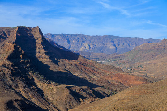 Panorama with mountains and canyon Fataga ravine (Barranco de Fataga) seen from viewpoint Mirador Degollada de las Yeguas on Canary Island Gran Canaria, Spain