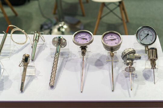 Industrial temperature and pressure gauges on display