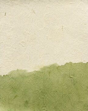 Matcha green tea wash on handmade washi paper at the bottom edge