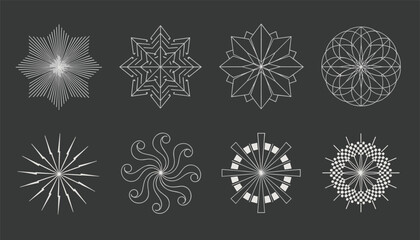 Obraz premium Set of eight circular geometric abstract shapes and detailed white snowflakes isolated on a dark gray background.