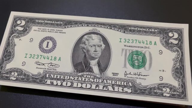 Dynamic perspective close up of rare United States two dollar bill