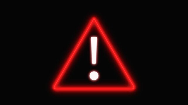 Red glowing warning hazard sign with exclamation point flashing on dark background.