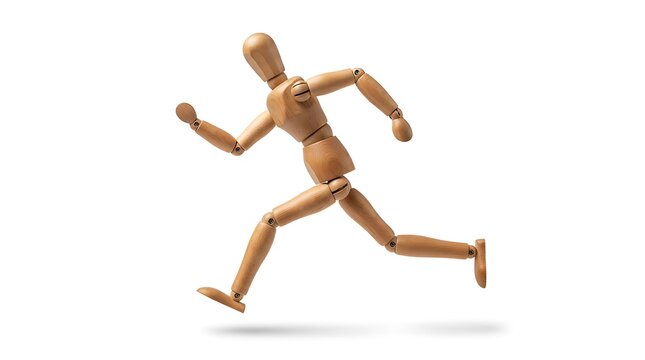 Wooden articulated mannequin captured in a running pose isolated on white