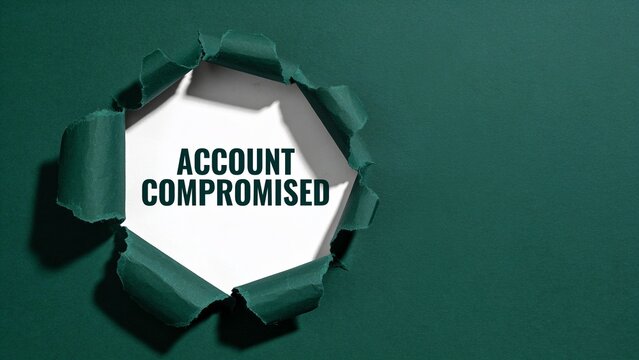 Account compromised warning sign breaking through green digital interface hole