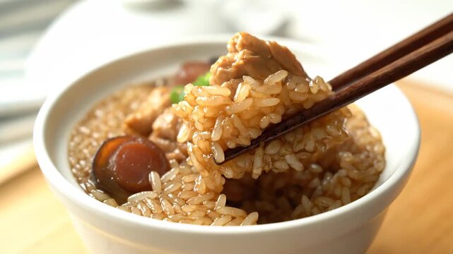 Close up of chicken, mushrooms and rice in a bowl, close up of braised pork rice