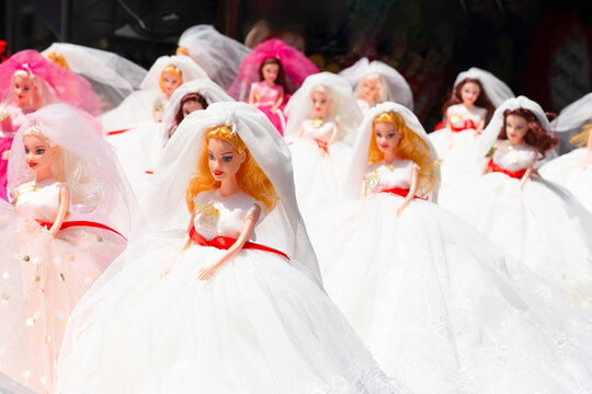 Istanbul, Turkey: May 18, 2026: Traditional bride dolls (gelin bebek) dressed in white wedding gowns for sale at a souvenir shop