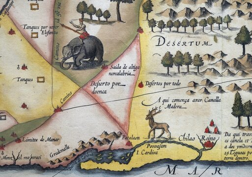 Old coloured map of Ceylon or Sri Lanka decorated with an elephant, by Jodocus Hondius from the Mercator Hondius Atlas, Amsterdam, 1633