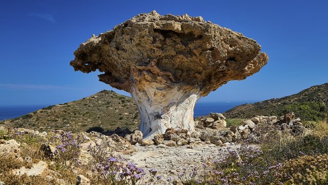 Impressive rock formation with views of the sea and surrounding hills, mushroom rocks, mushroom rock, bizarre rocks, rock formation, Skiadi, Kimolos, Cyclades, Greek Islands, Greece