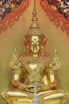 Symbolic depiction of Buddha as an enlightened, radiant and royal being in princely jewellery, with a flame-shaped ornamental halo (aureole), Buddhist temple complex Wat Phra That Sorn Kaew, Khao Kho mountains, Phetchabun province, Isan, Thailand