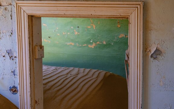 Interior view, doors and house full of sand, former diamond mining town, Namib Desert, Kolmanskop, Karas, Namibia