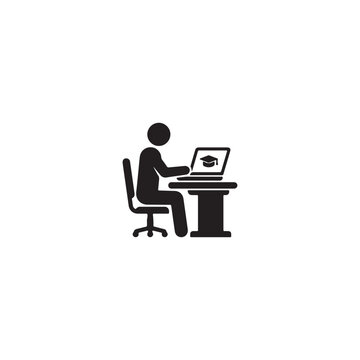 Person sitting at a desk with a laptop for online education