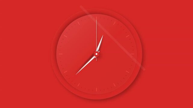 Minimalist red clock face with white hands moving against red background