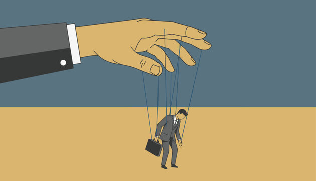 Small businessman is controlled like a puppet on strings by a giant powerful hand representing corporate control.