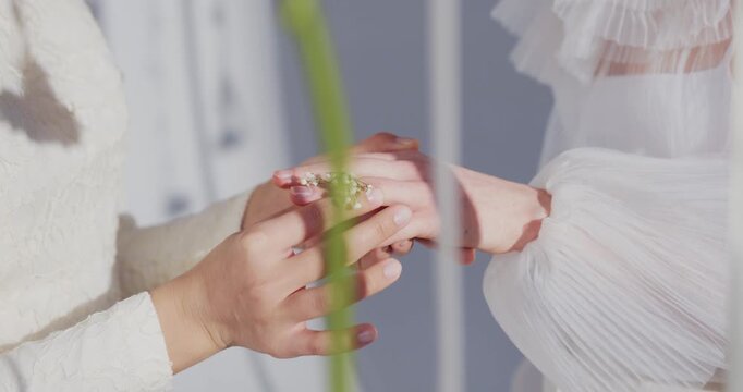 man and woman hands, couple hands, hands together, romantic touch, love gesture, holding hands, interlocked fingers, gentle grip, wedding rings, couple bonding, intimate moment, close up, no face, 