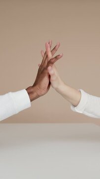 man and woman hands, couple hands, hands together, romantic touch, love gesture, holding hands, interlocked fingers, gentle grip, wedding rings, couple bonding, intimate moment, close up, no face, 