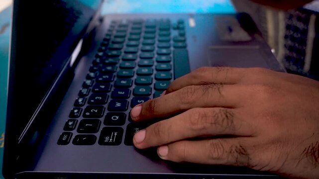 A person opening a laptop computer and starting to work, capturing daily office routines, remote tasks, and modern digital technology use in a professional workspace environment.