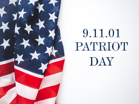American flag on a white background. Symbolizes remembrance, patriotism, and national unity. Ideal for memorial, historical, and patriotic content	