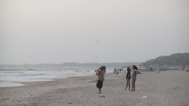 Juggler Performing on Arambol Beach, Goa, India &ndash; Wide Shot