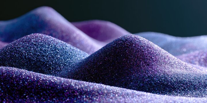 Close-up of shimmering, undulating mounds of purple and blue glitter