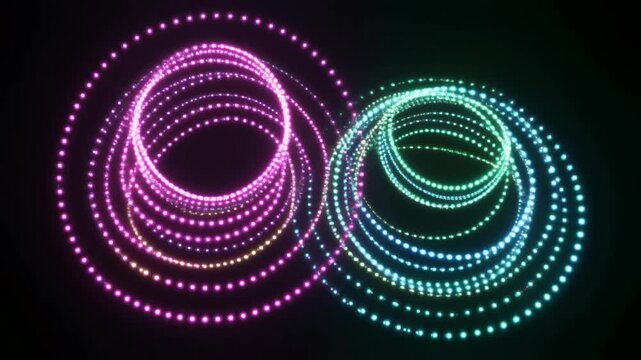 紫と緑が溶け合う二つの光の輪