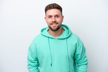 Fototapeta premium Young caucasian man isolated on white background laughing