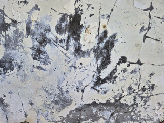 Obraz premium ​Peeling Paint and Cracked Old Damaged Wall Texture Background