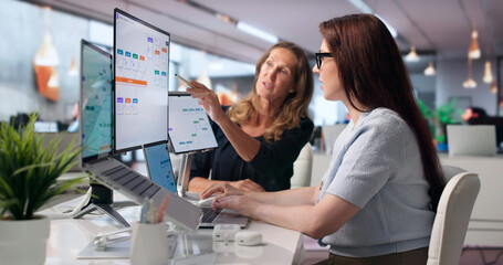 Businesswoman Uses Laptop To Improve Digital Workflow