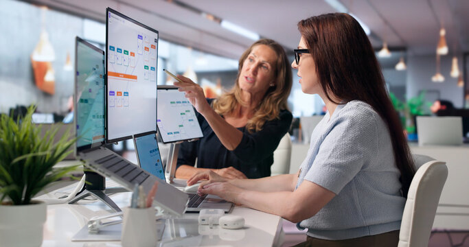 Businesswoman Uses Laptop To Improve Digital Workflow