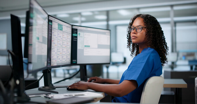 African American Healthcare Administrator Efficiently Manages Patient Intake