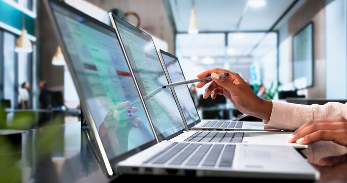 Young Compliance Officer Reviews Real-time Alerts