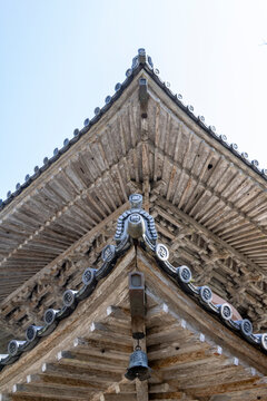 Ornate wooden roof of Hotsumisakiji Temple, Japan