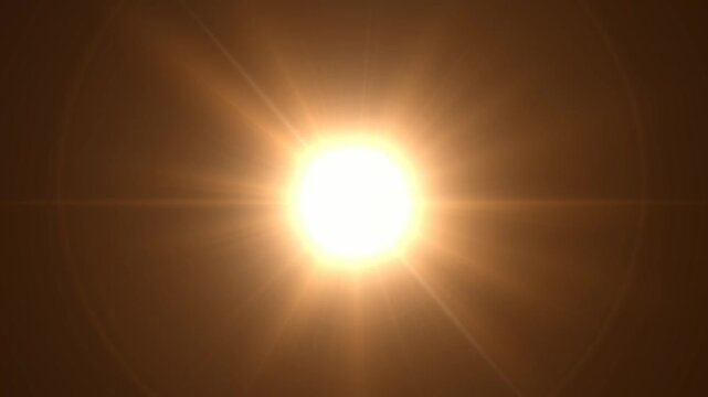 Sun rays background with golden light streaks lens flare effects.