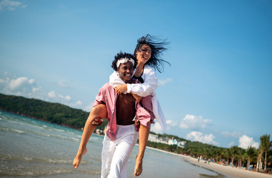 Couple enjoying their tropical vacation with peace of mind, secured by reliable travel insurance